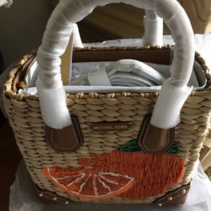 Vintage and classic brand new. Never used. Michael Kors Woven Straw Purse